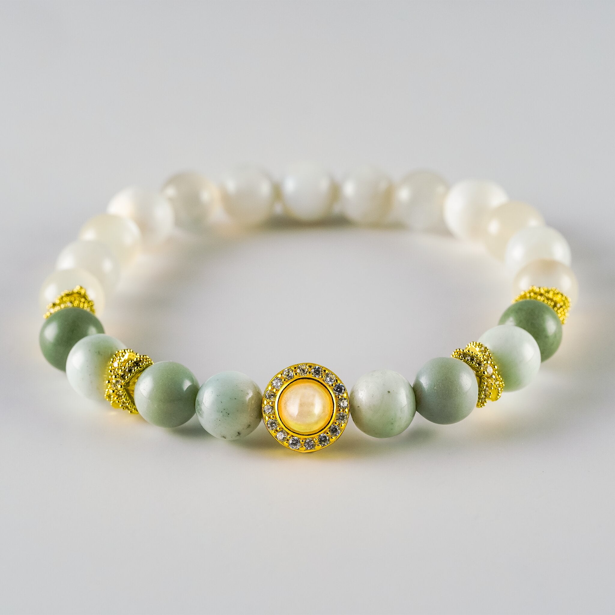 Opal Oracle Collection Amphitrite Tide bracelet by XOIAX, front view with Amazonite, White Opal, Moonstone beads and gold-plated Opal medallion