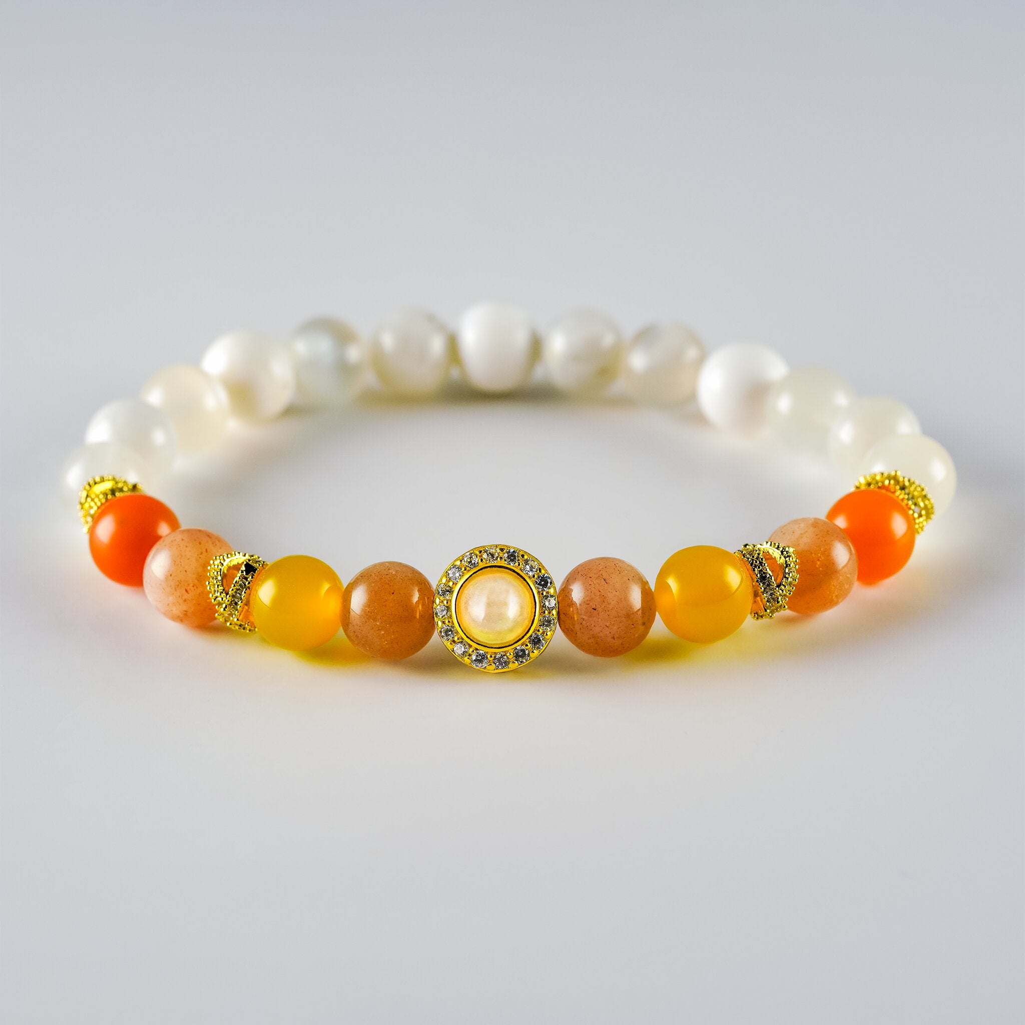 Opal Oracle Collection Selene Illumination bracelet by XOIAX, front view with White Opal and Moonstone beads and gold-plated Opal medallion charm