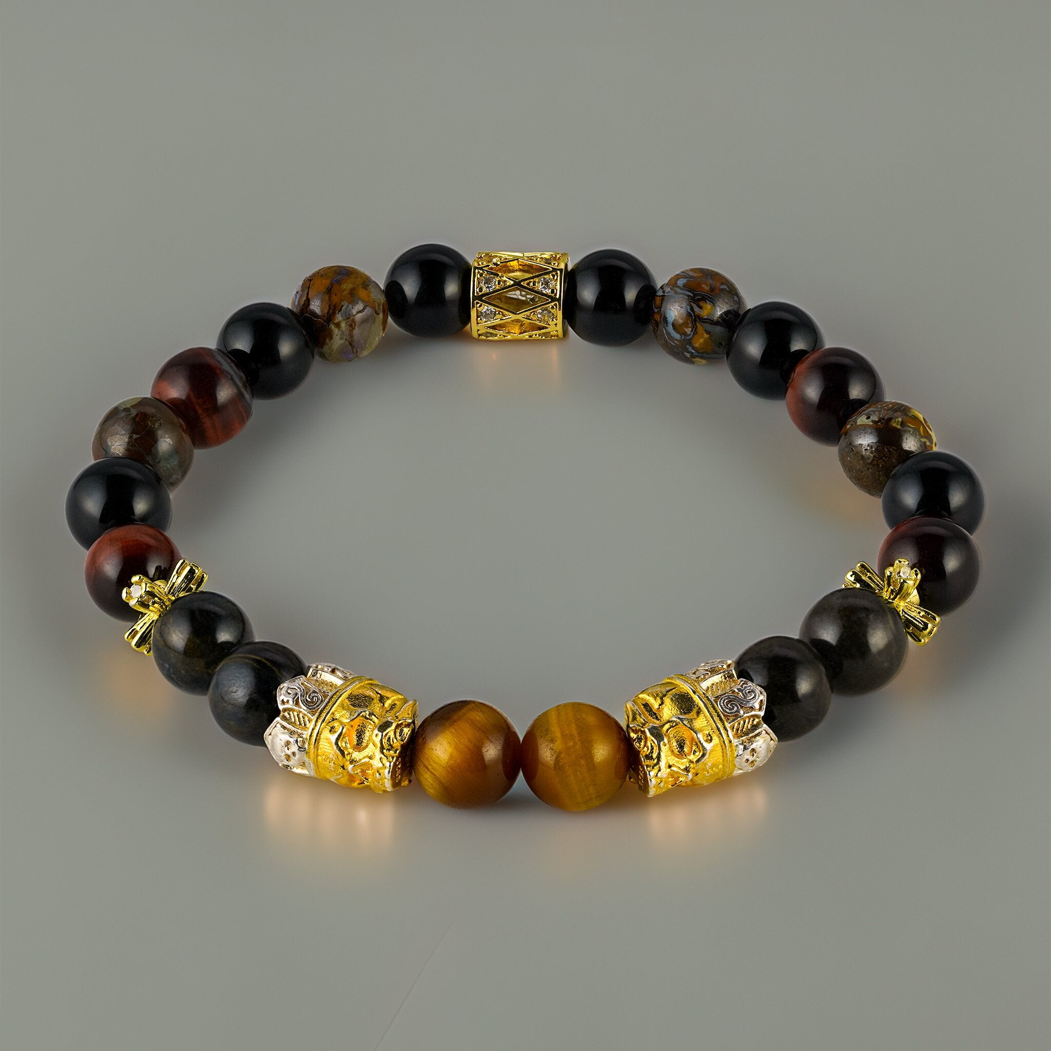 Memento Collection Amor Fati skull bracelet by XOIAX with Golden Tiger Eye, Red Tiger Eye, Pietersite, Australia Rainbow Opal and Obsidian beads, twin 24K gold-plated skull charms