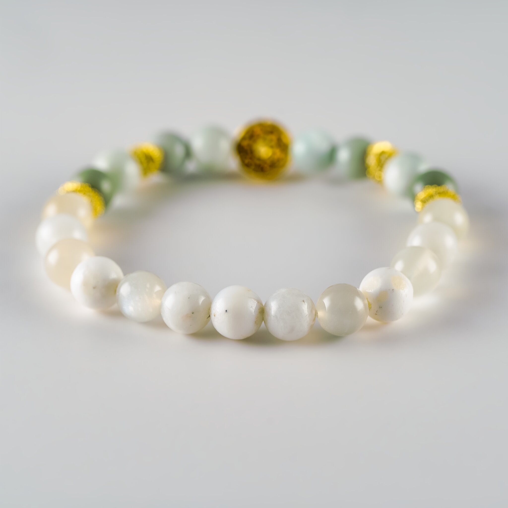Opal Oracle Collection Amphitrite Tide bracelet by XOIAX with White Opal, Moonstone, Amazonite and Blue-Grey Alashan Agate beads, back view with 24K gold-plated accent
