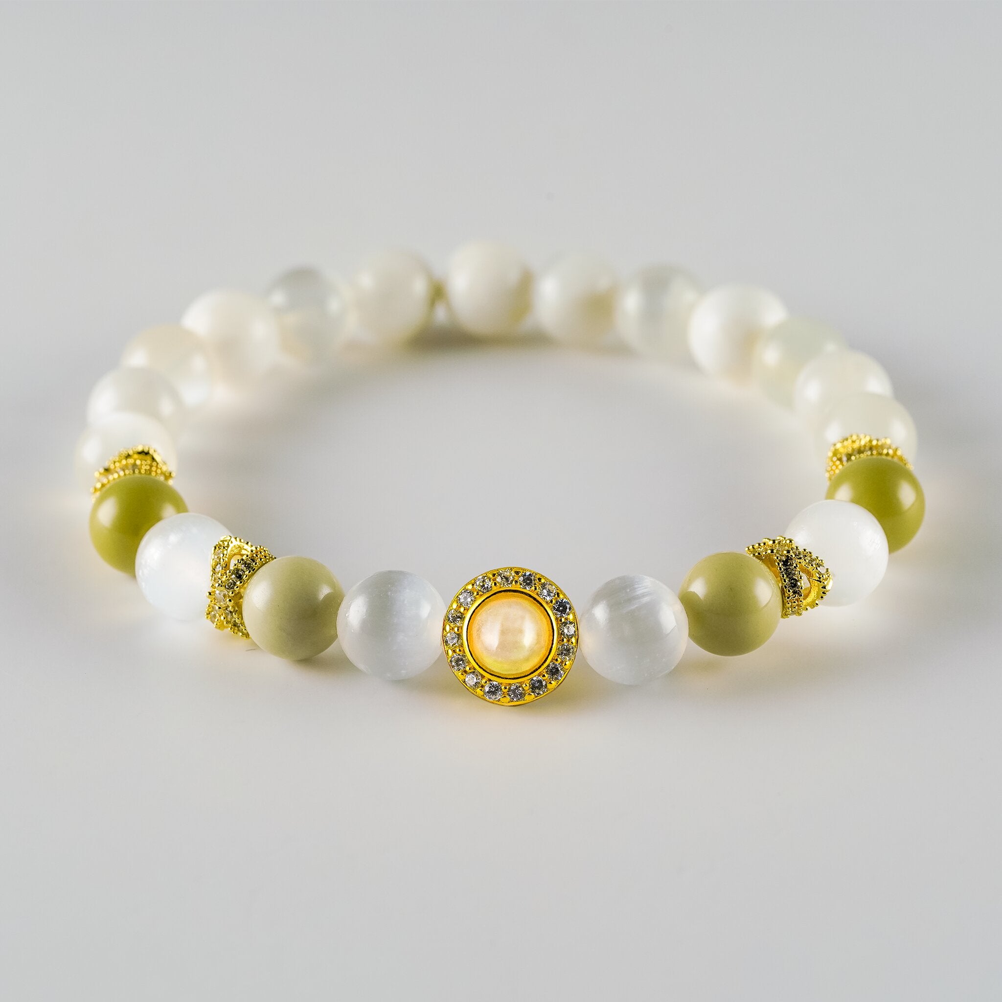 Opal Oracle Collection Artemis Sanctuary bracelet by XOIAX, front view with White Opal, Moonstone beads and gold-plated Opal medallion charm