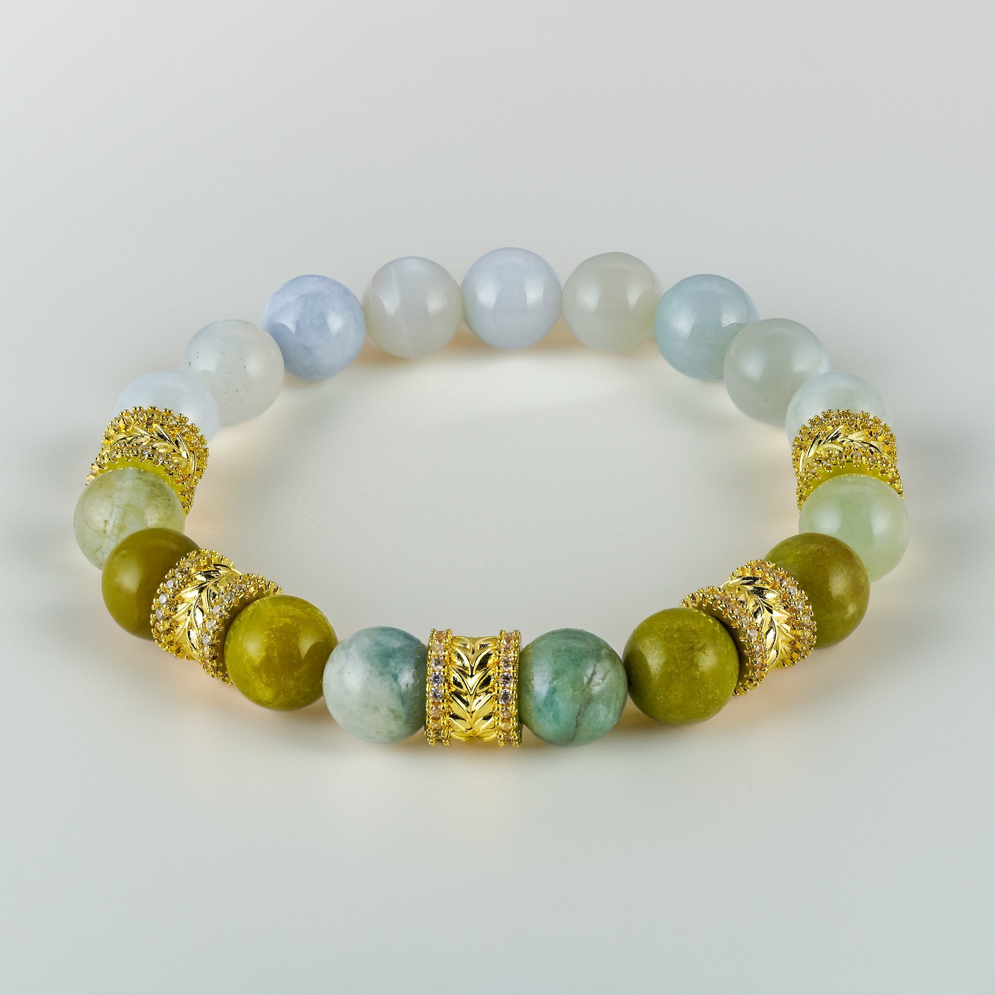 Golden Wreaths The Eden Halo limited edition bracelet by XOIAX with Olive Agate, Burmese Jade, Kiwi Jasper, and Moonstone beads, a feng shui bracelet celebrating feminine growth
