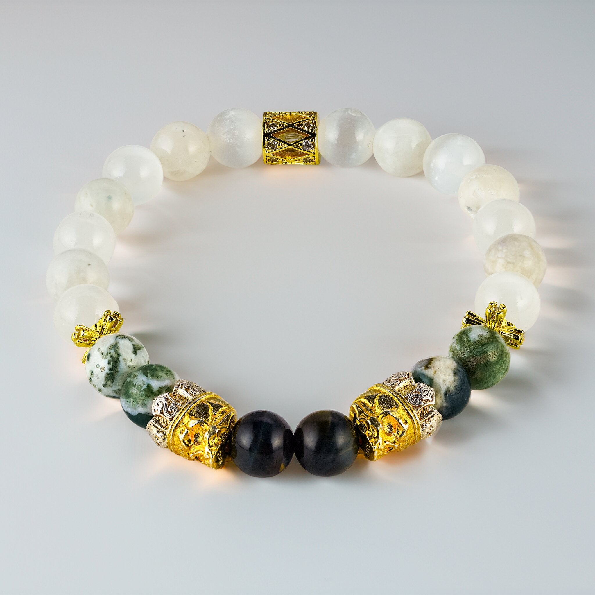 Memento Collection Memento Vivere skull bracelet by XOIAX, White Jade, Selenite, and Tree Agate beaded bracelet with gold-plated skull charms