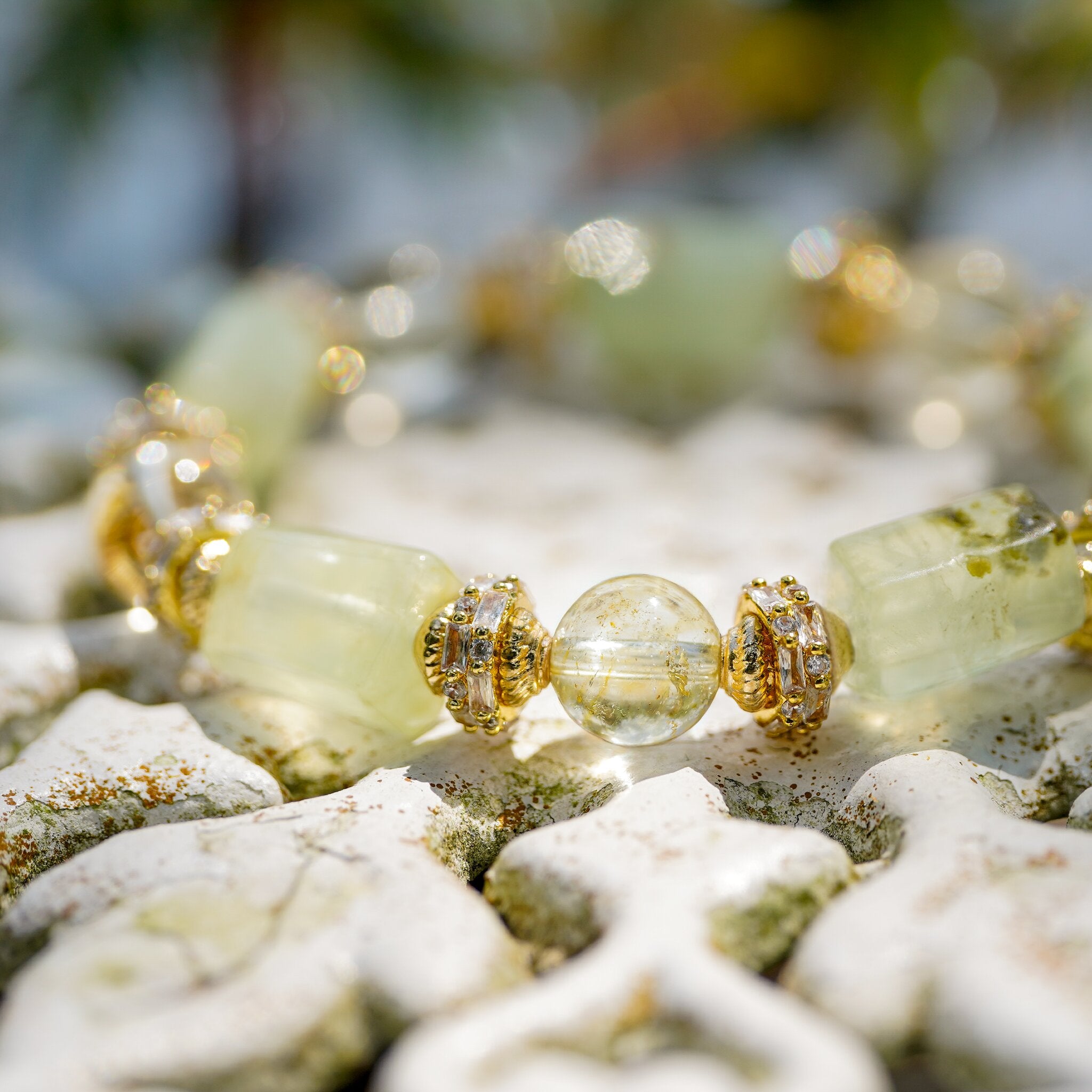 Lin 林 Collection Morning Dew bracelet by XOIAX with Green Prehnite and Citrine beads, close-up KV shot with 18k gold plated accents