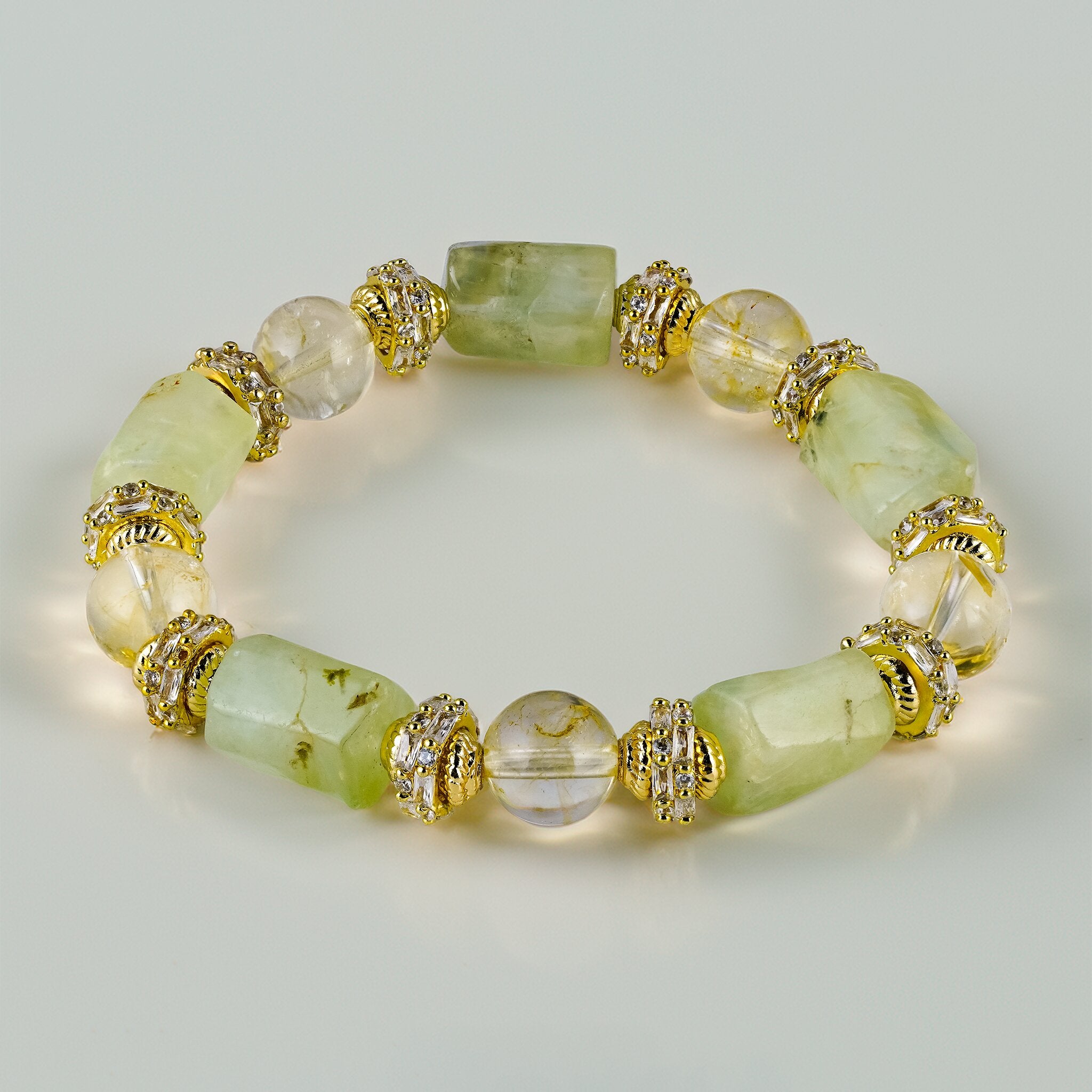 Lin 林 Collection Morning Dew bracelet by XOIAX, Green Prehnite and Citrine gemstone bracelet with gold spacers on light background