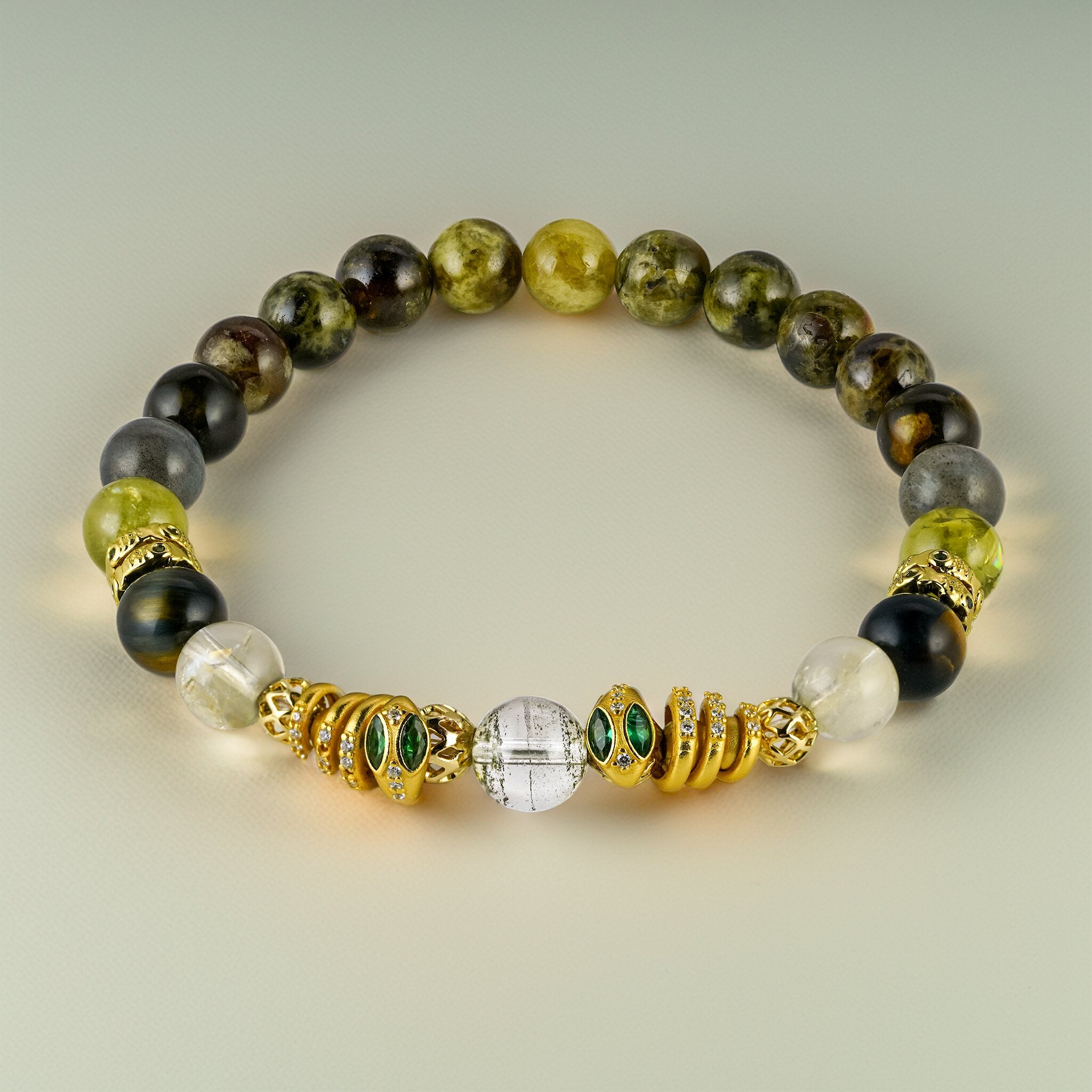 XOIAX Secret Guardians Royal Serpents Naga bracelet with Green Phantom Quartz, tiger eye, and labradorite beads accented by emerald-eyed gold serpent charms