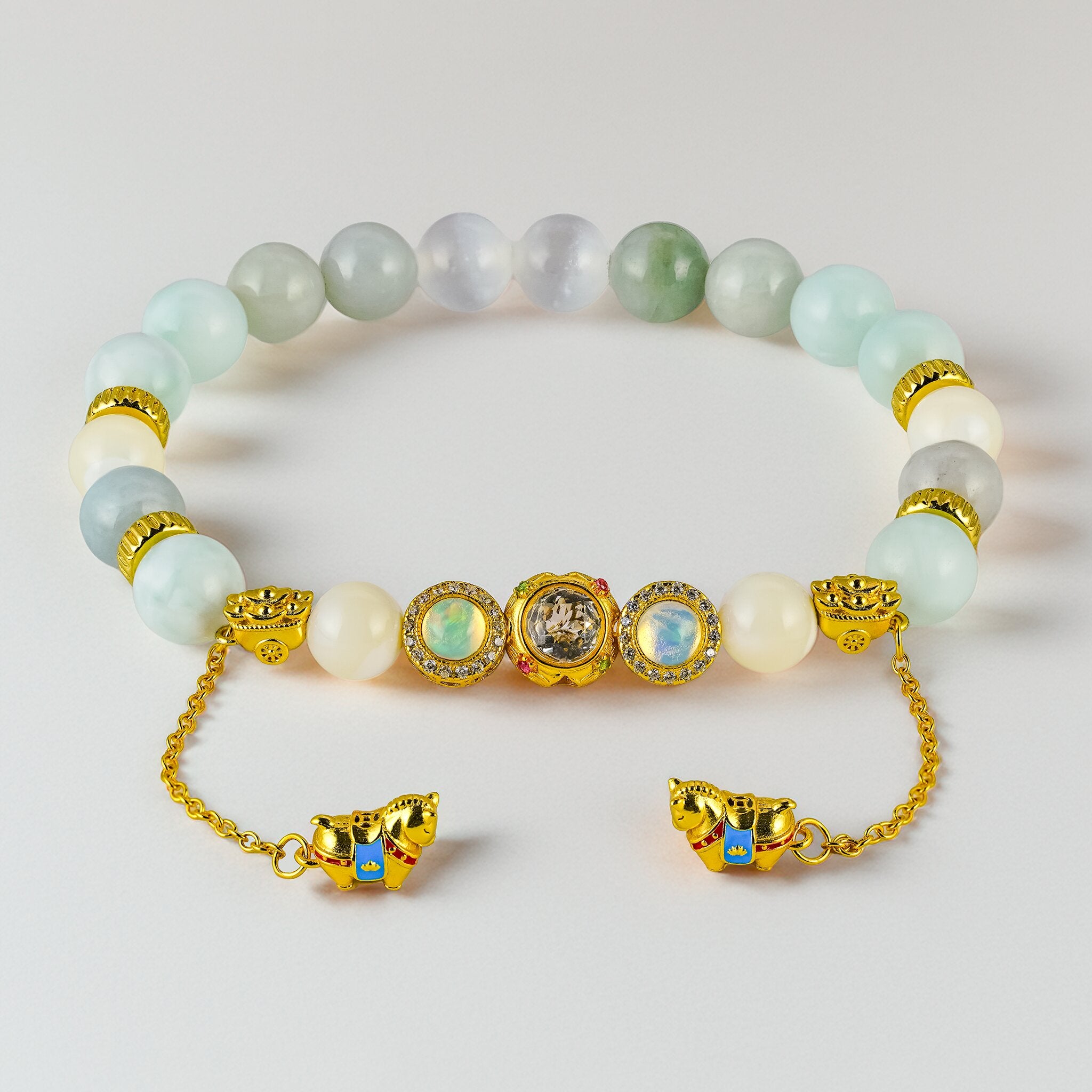 Heavenly Four Celestial Pegasus Limited Edition The Crescent bracelet by XOIAX with Burmese Jade, Mother of Pearl, and Selenite beads, 24k gold plated dangling horse charms